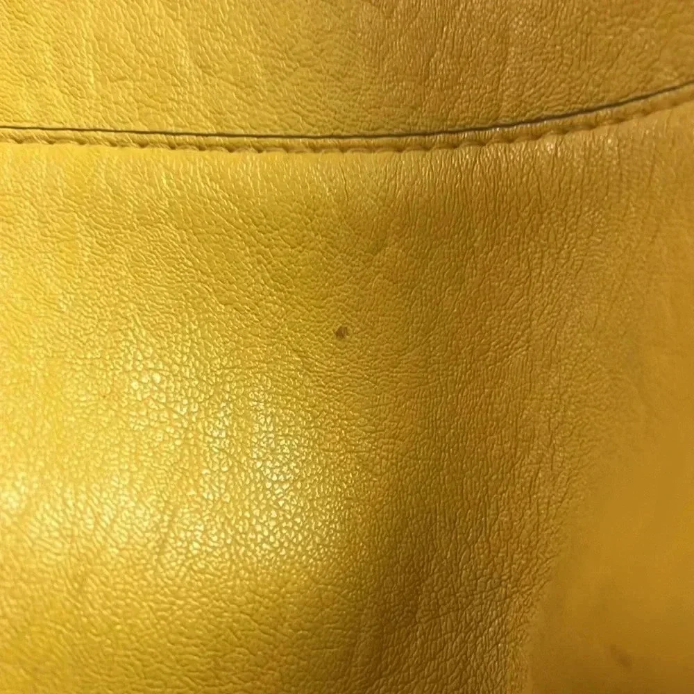 Calvin Klein few spots well loved pvc material.
